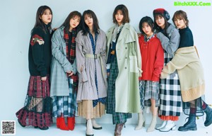 A group of young women posing for a magazine cover.