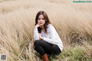 a close up of a woman with long brown hair